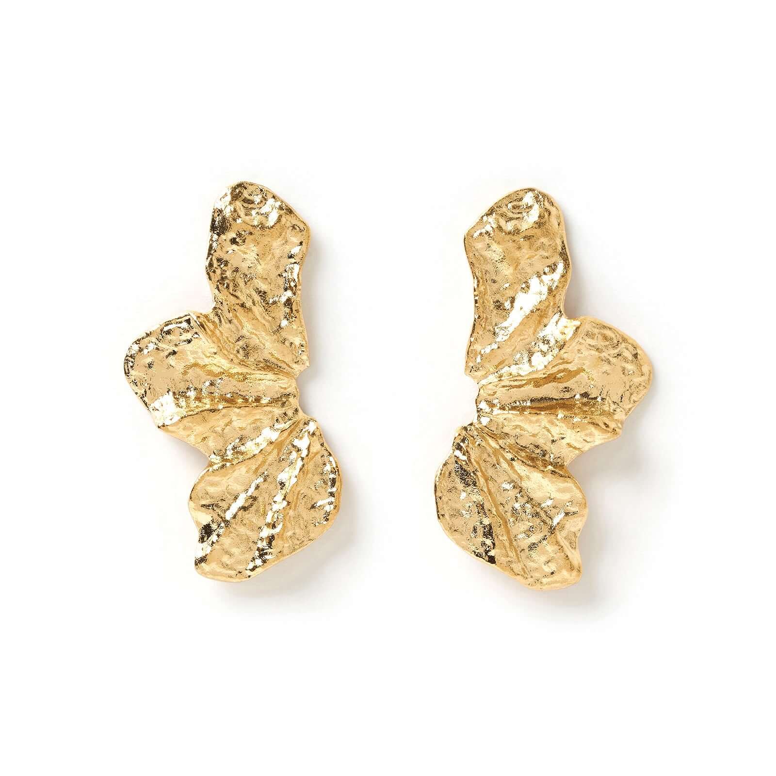 A pair of gold earrings