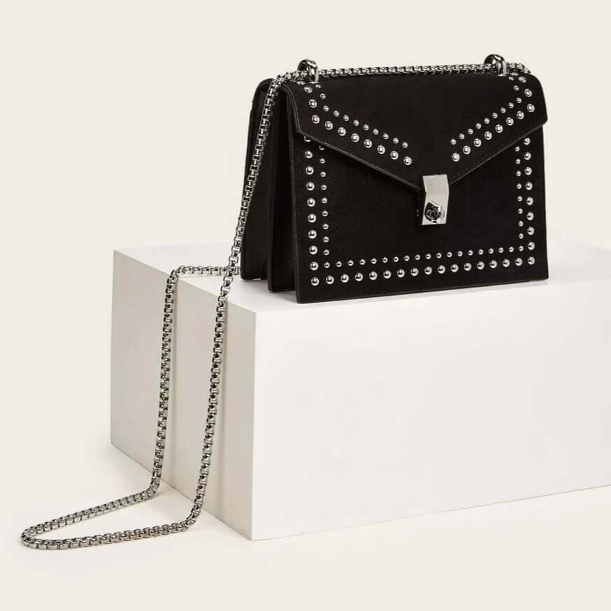 Black studded vegan leather bag