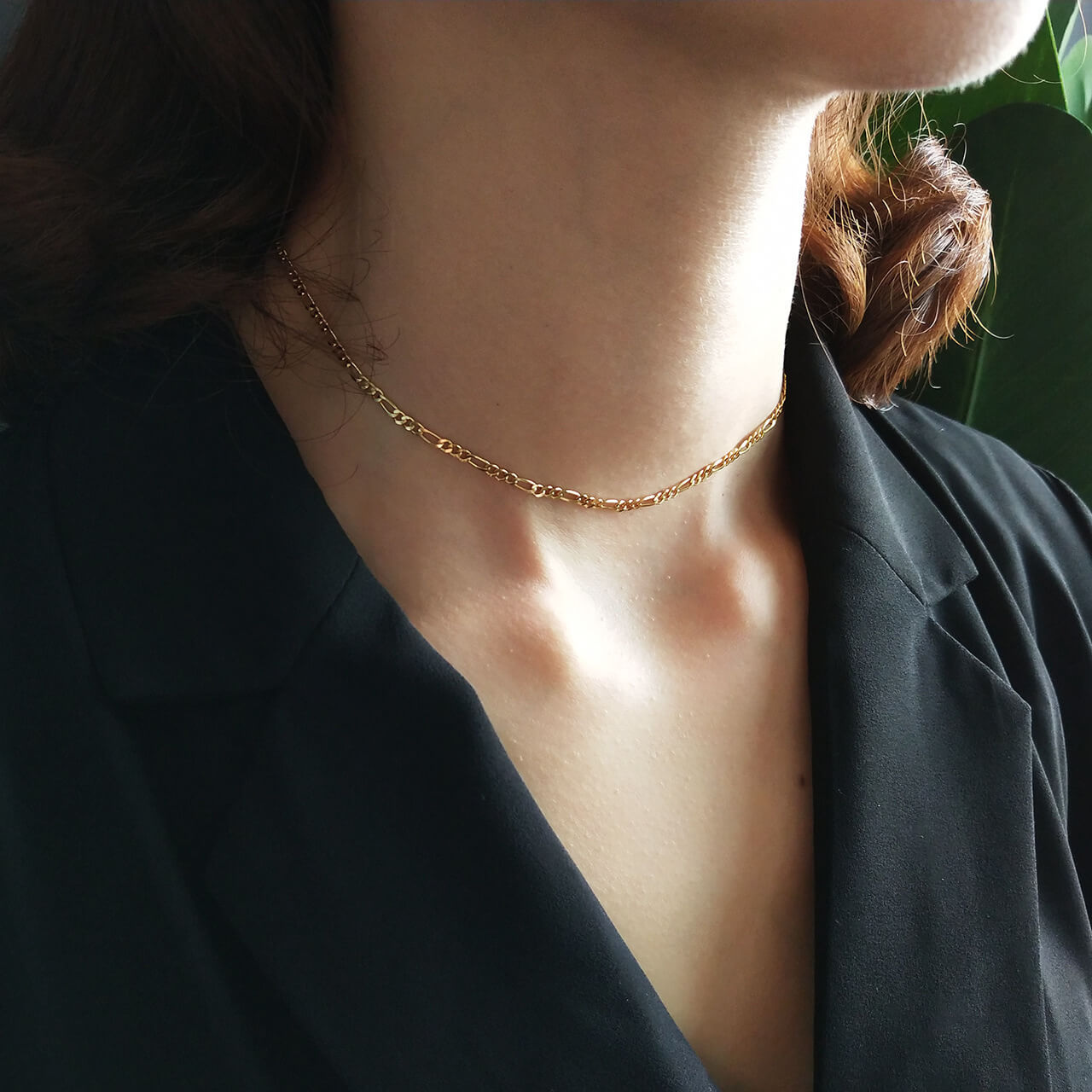 Model wearing Figaro Gold Chain Necklace