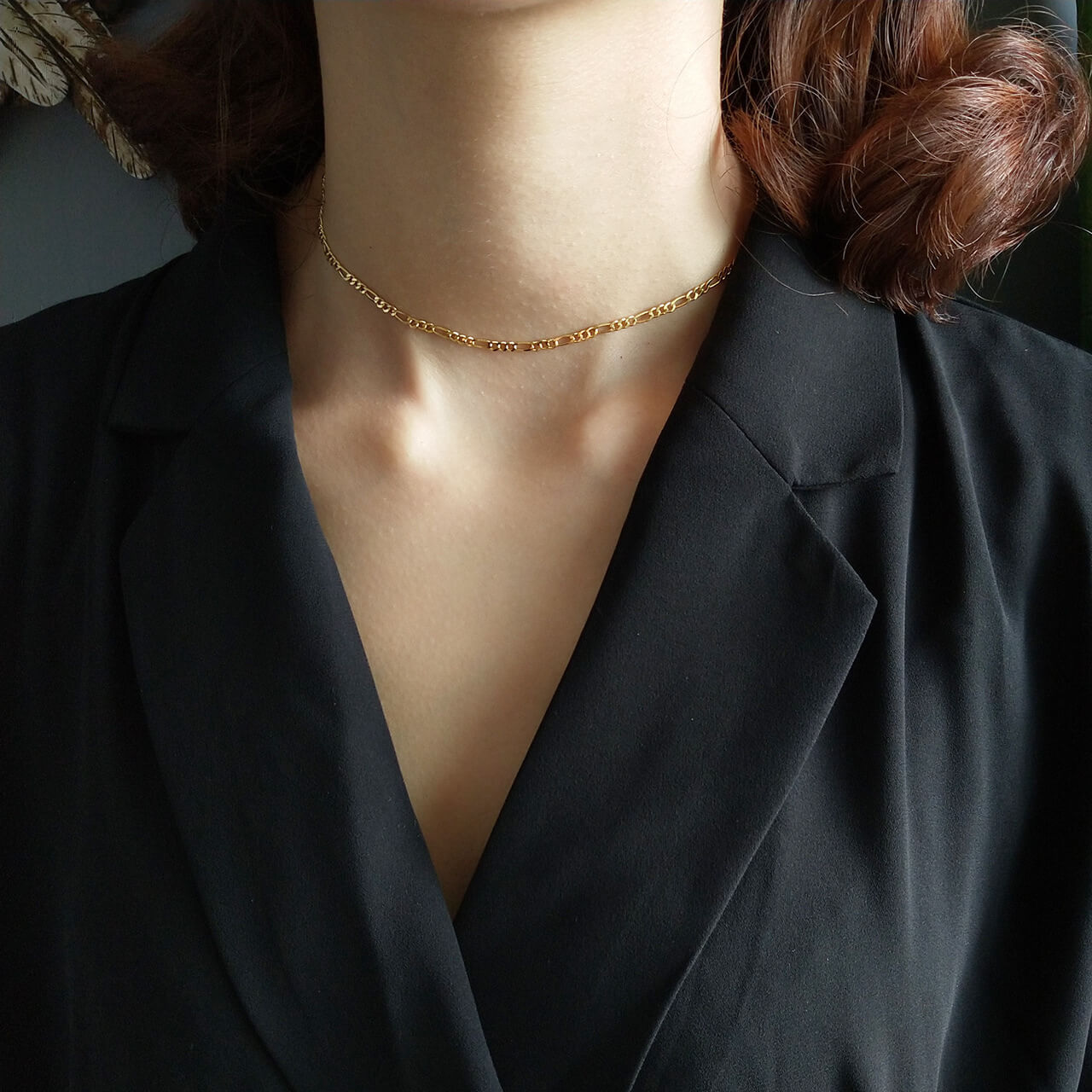 Model wearing Figaro Gold Chain Necklace