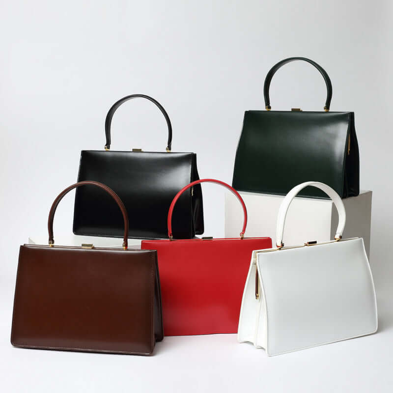 Five vintage leather handbags 