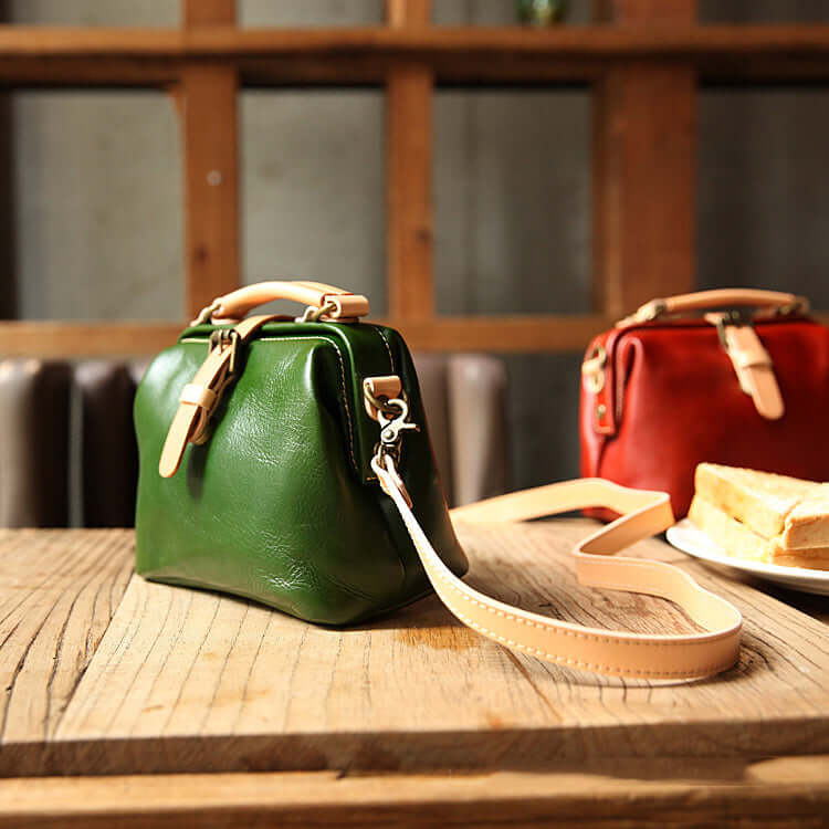 Green and red leather handbags