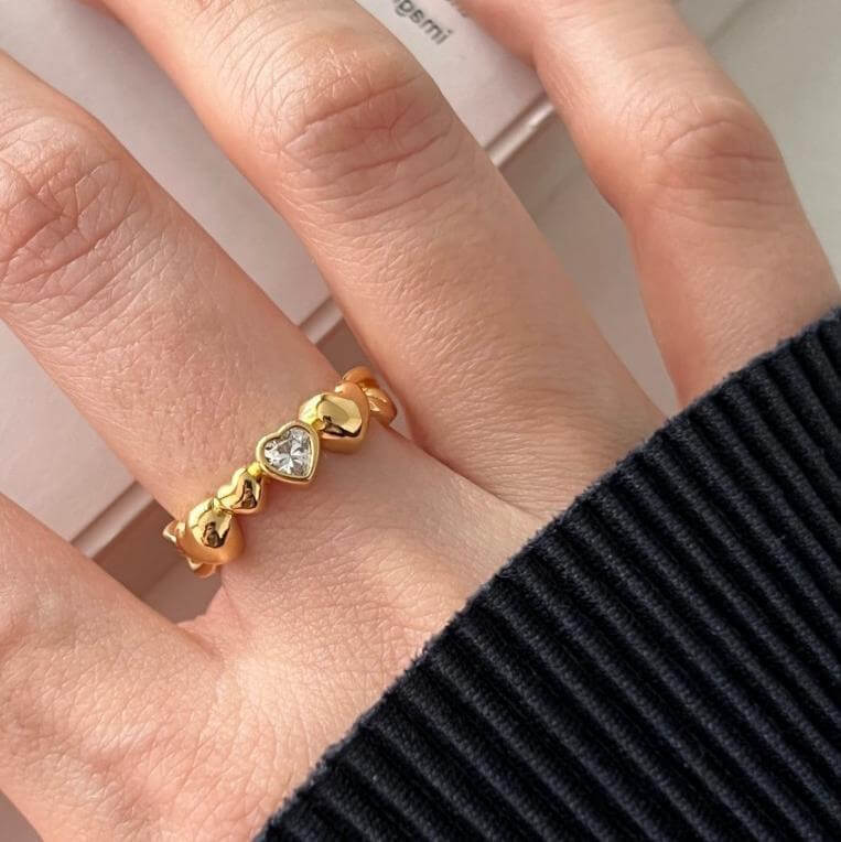 Model wearing Gold Zircon Hearts Ring