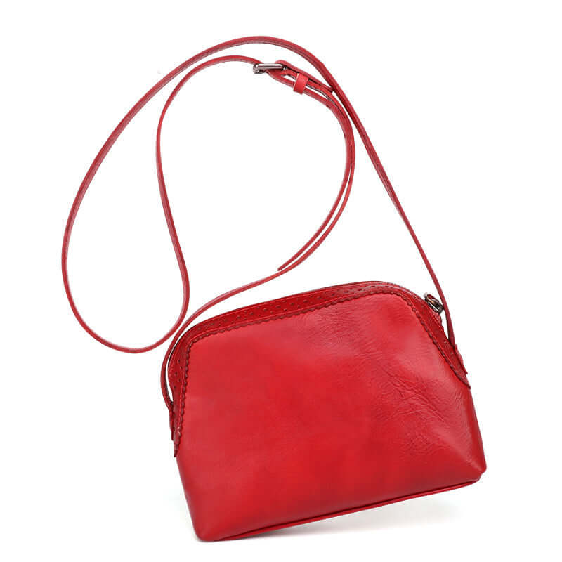 A red leather crossbody bag