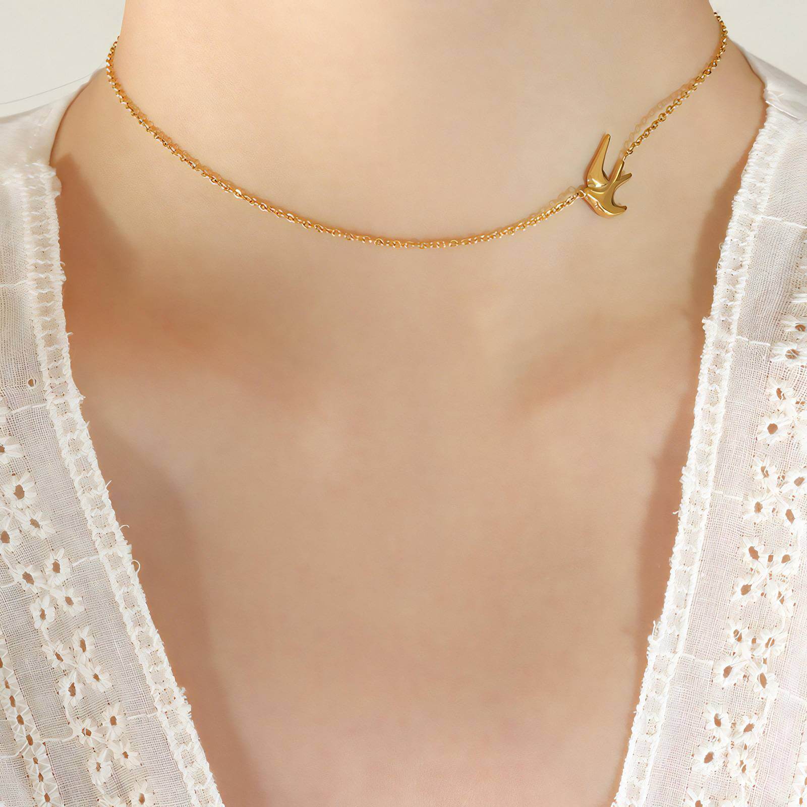 Swan design gold chain necklace