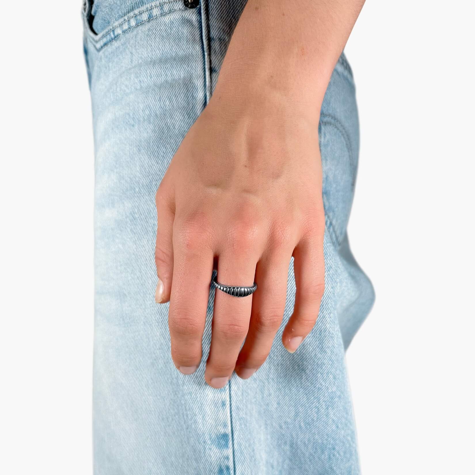 Model wearing Thin silver croissant ring