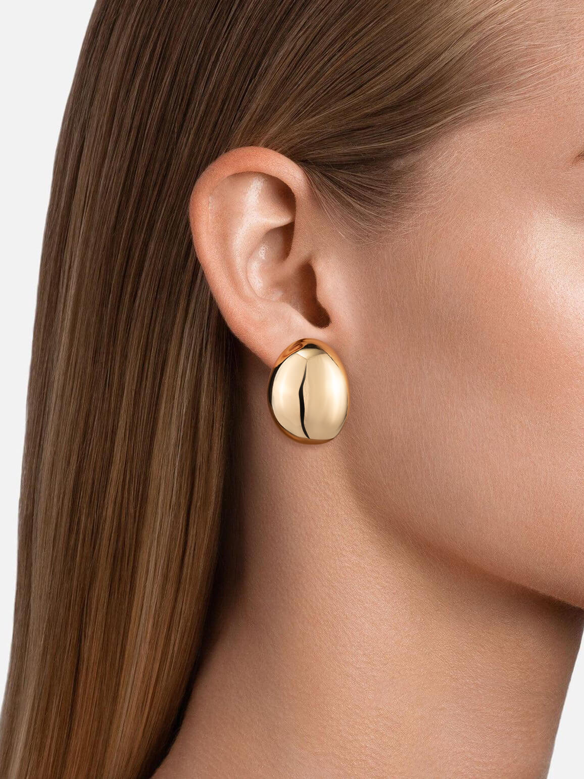 model wearing Sphere Drop Earrings gold