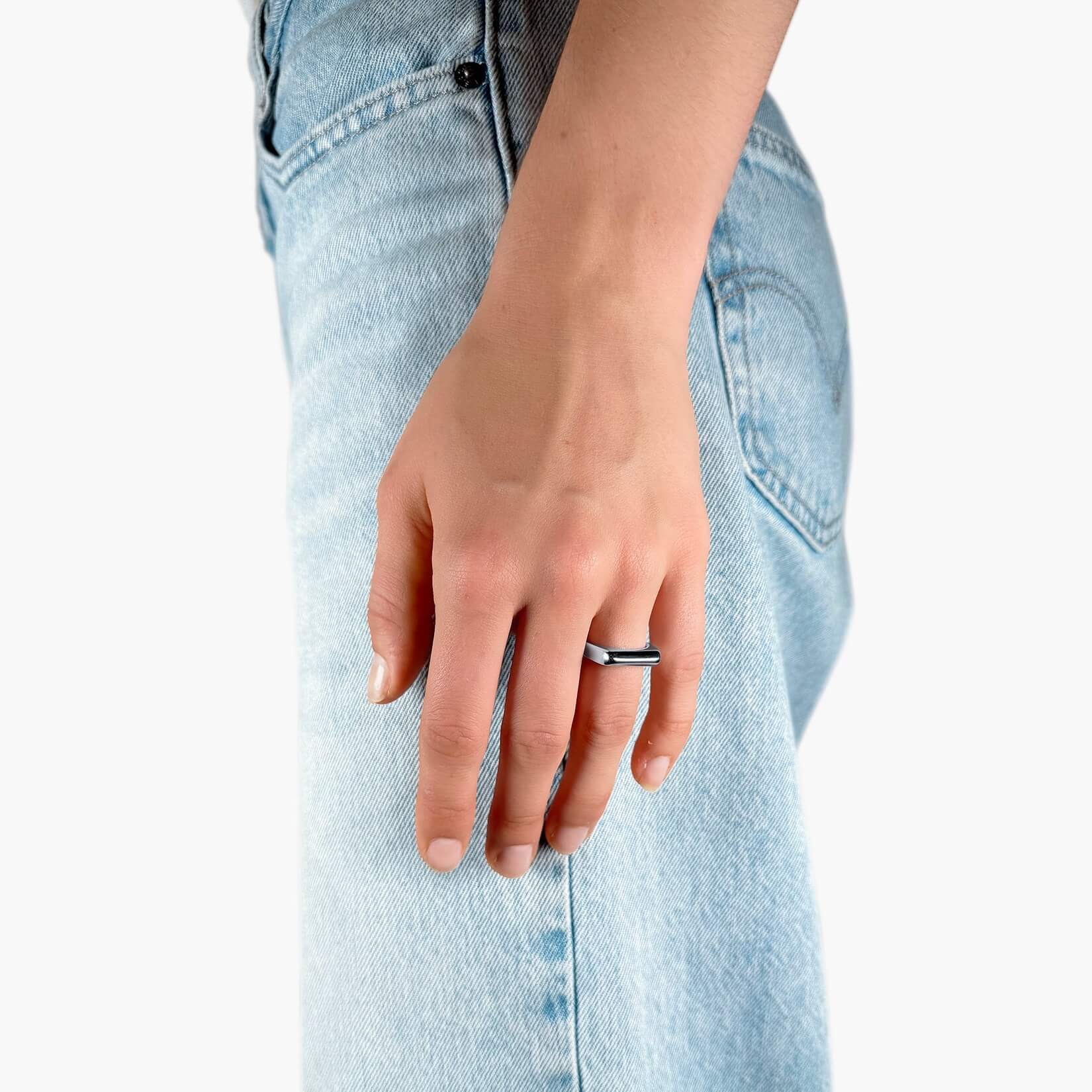 Model wearing silver Flat Bar Ring