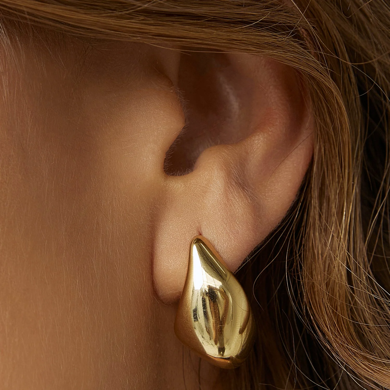 Gold Swerved Earrings