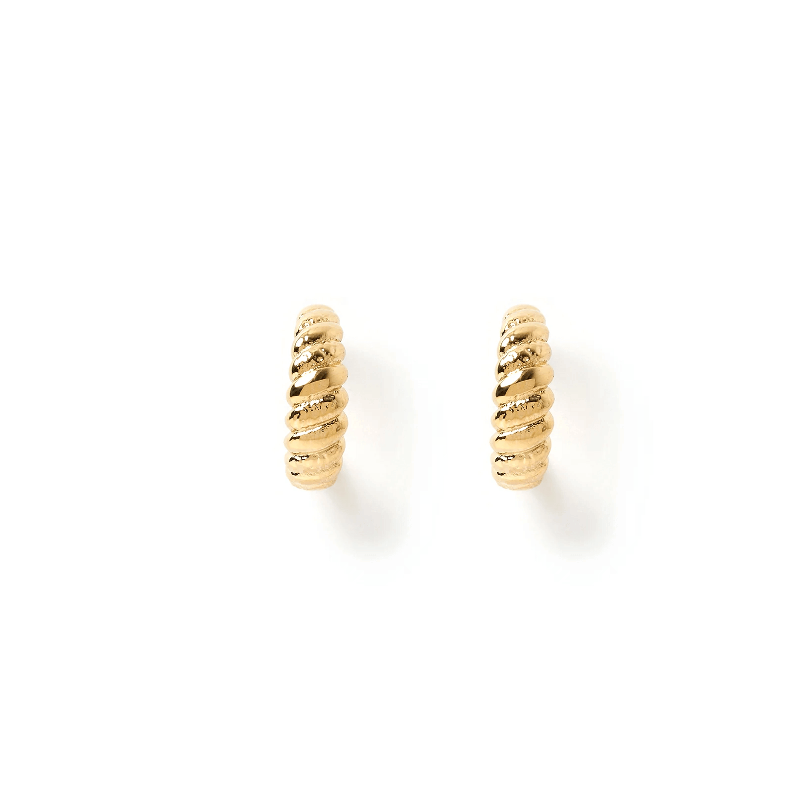 A pair of gold earrings