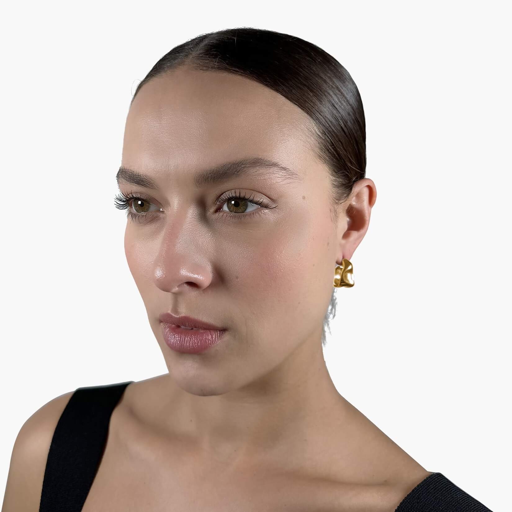 Model wearing Gold Melting Hoop Earrings