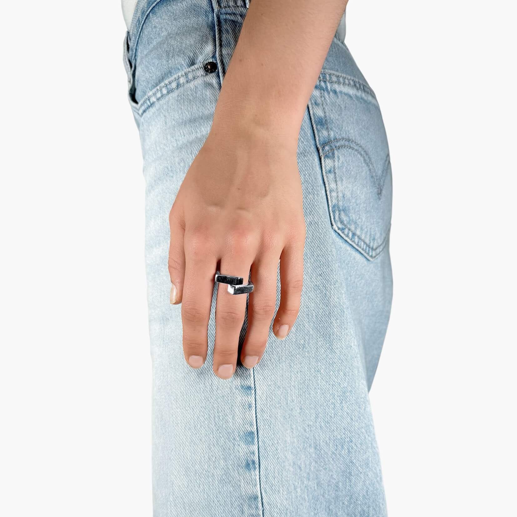 Model wearing Overlapping band ring silver