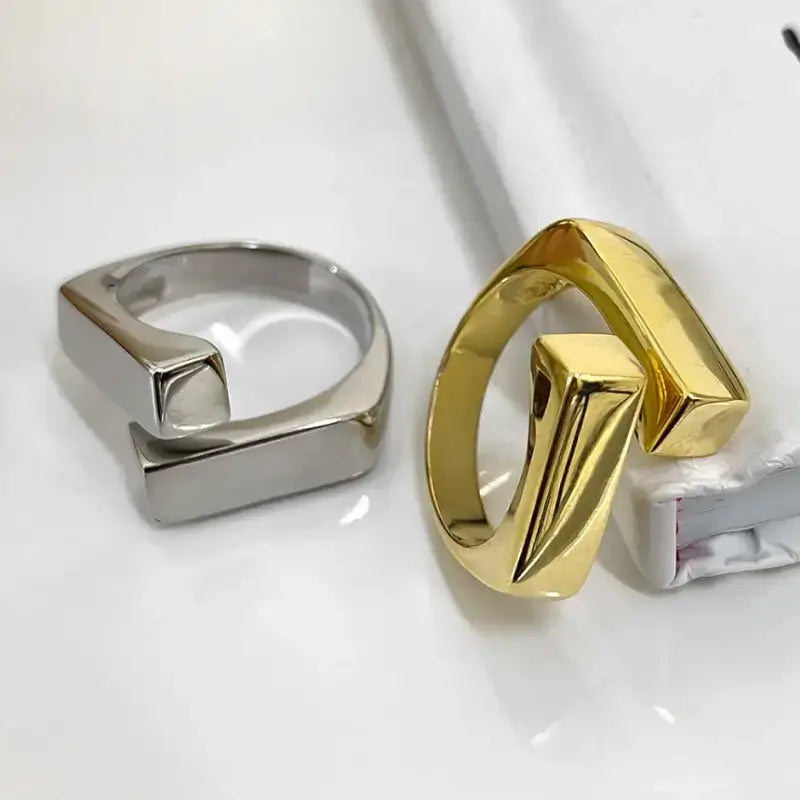 Overlapping band ring gold and silver