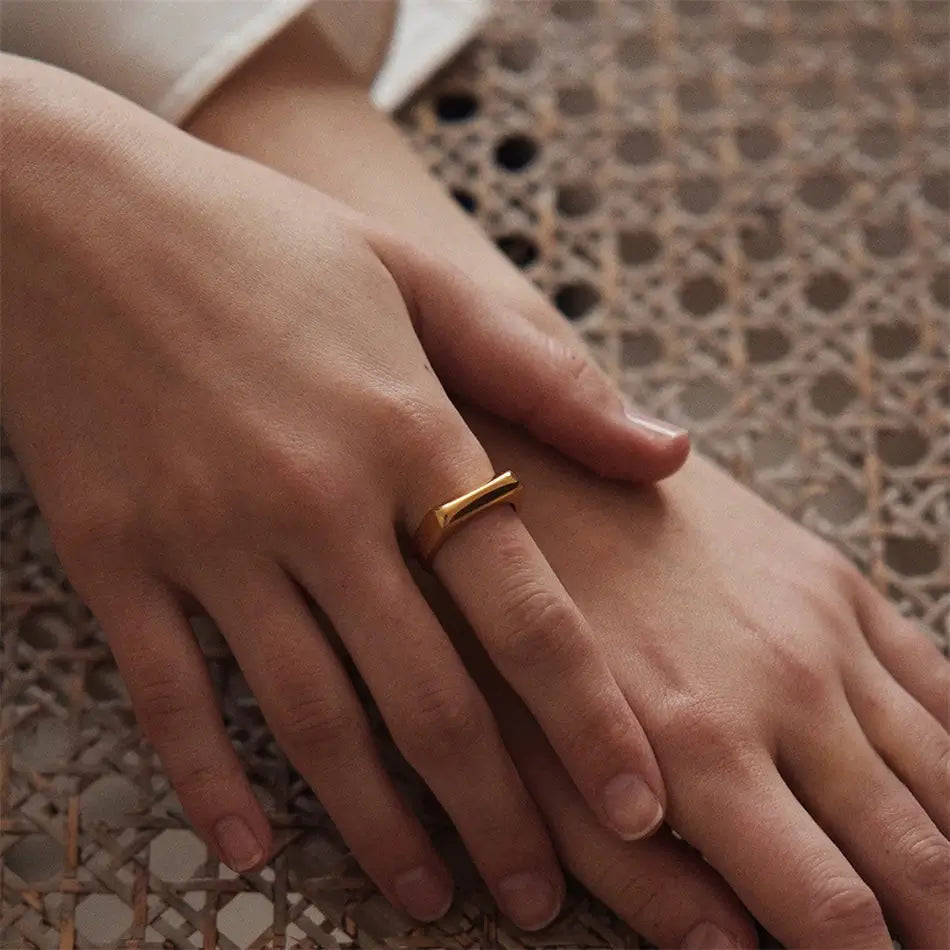 Model wearing Gold Flat Bar Ring