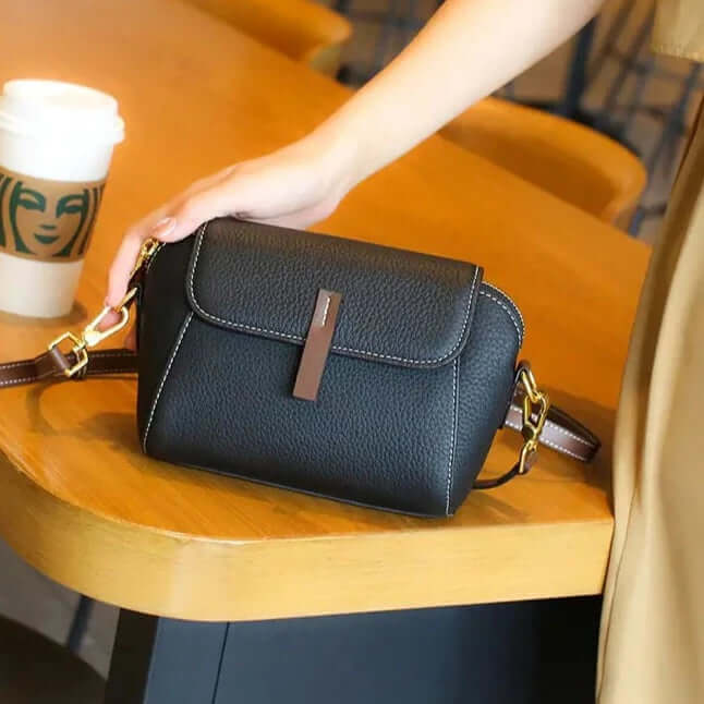 A black mini crossbody bag