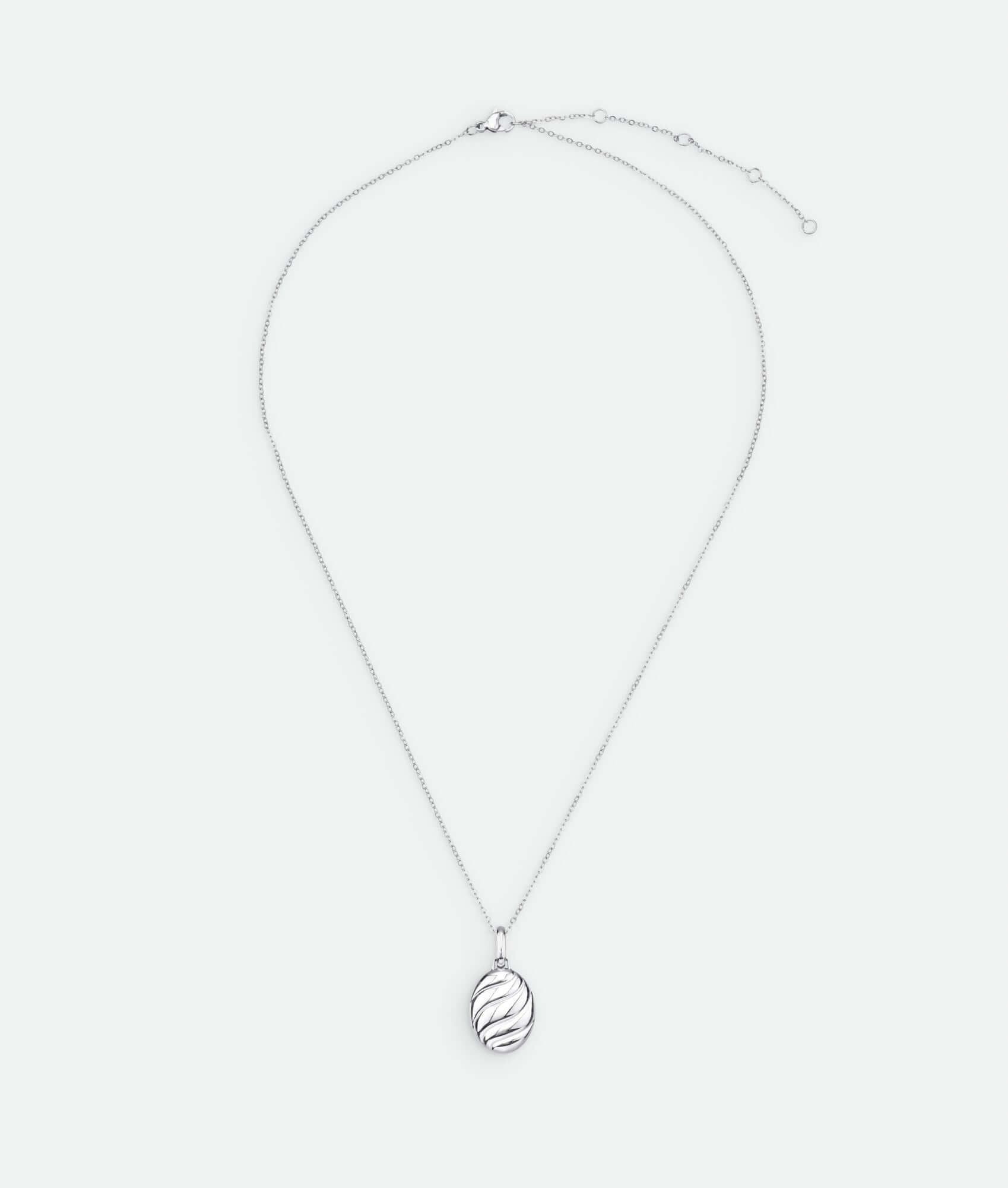 Silver necklace with croissant shaped pendant