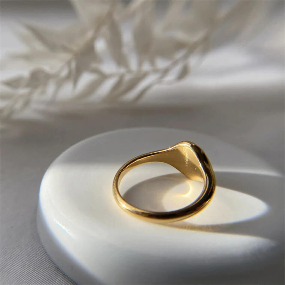 Gold sun signet ring