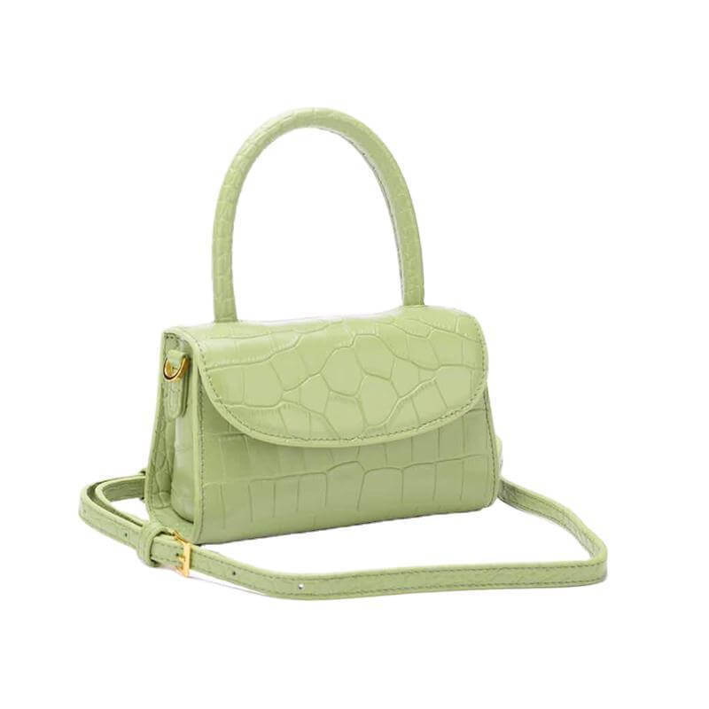 A light green mini crossbody bag